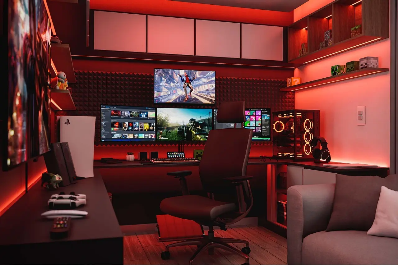 Gaming setup med flere skærme og rød arenaagtig belysning